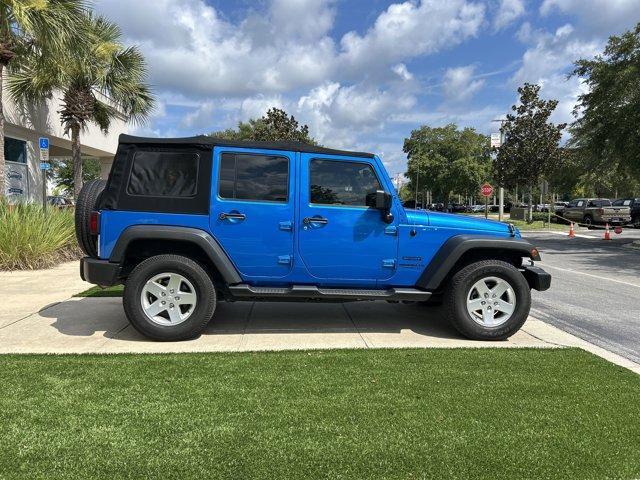 used 2015 Jeep Wrangler Unlimited car, priced at $23,941