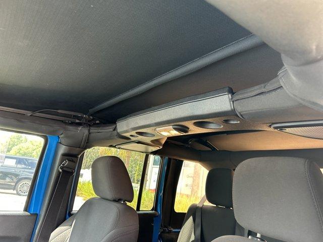 used 2015 Jeep Wrangler Unlimited car, priced at $23,941