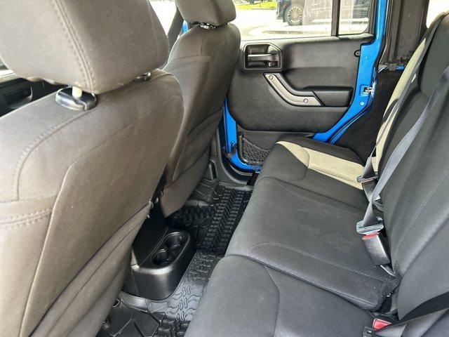 used 2015 Jeep Wrangler Unlimited car, priced at $23,941