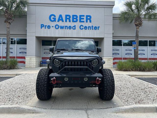 used 2018 Jeep Wrangler Unlimited car, priced at $23,721
