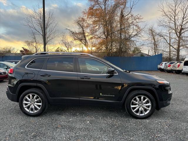 used 2014 Jeep Cherokee car, priced at $11,995