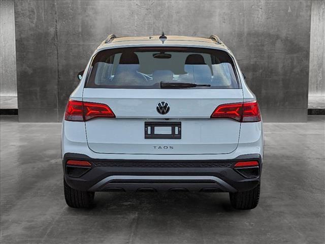 used 2023 Volkswagen Taos car, priced at $23,396
