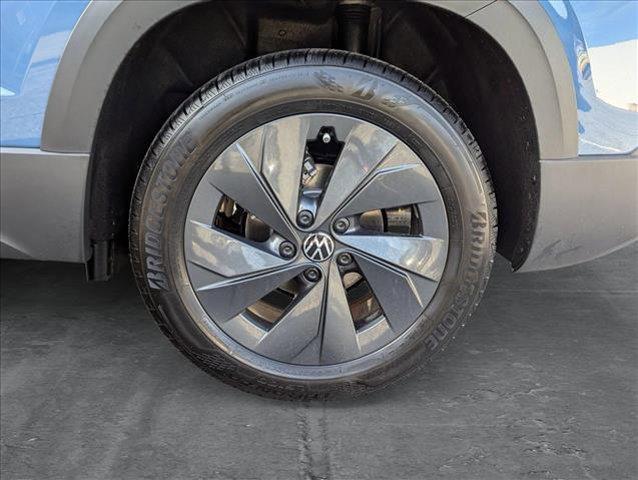 new 2025 Volkswagen Taos car, priced at $27,011