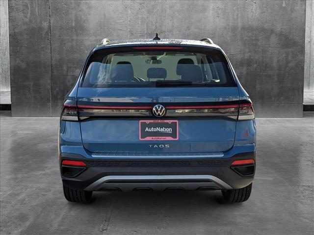 new 2025 Volkswagen Taos car, priced at $27,011