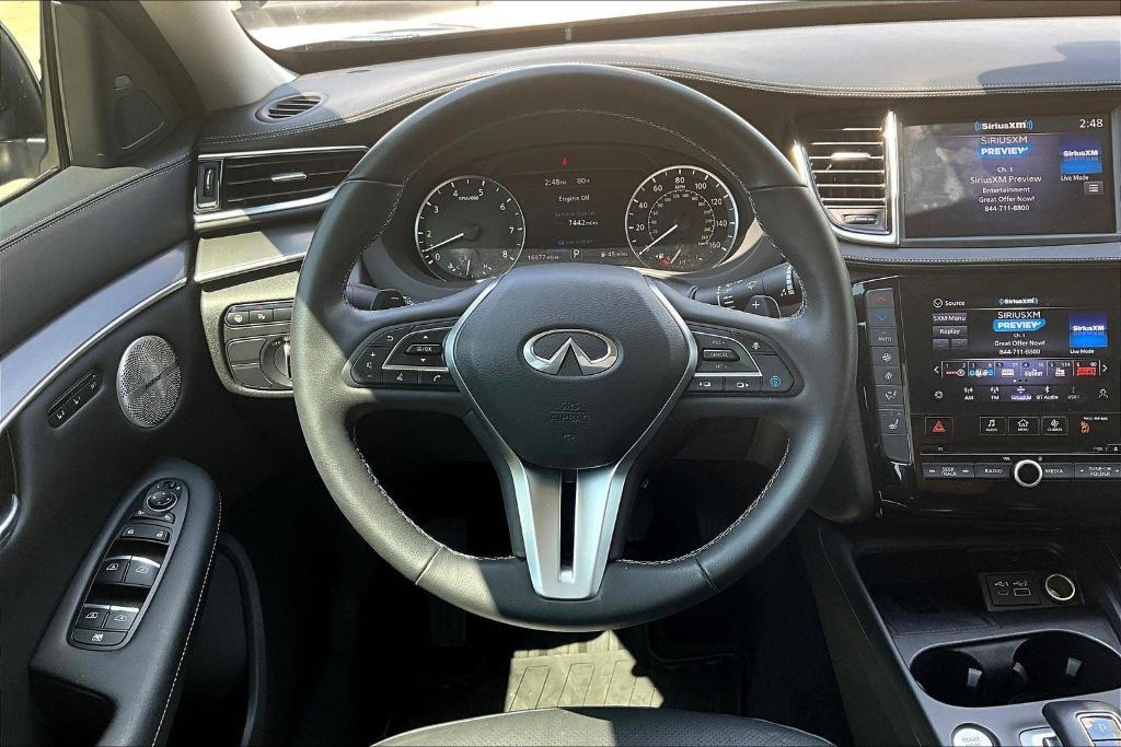 used 2024 INFINITI QX50 car, priced at $28,888