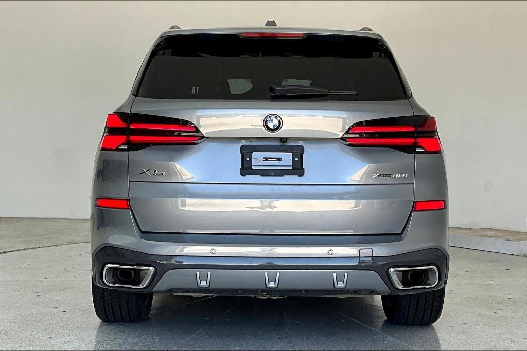 used 2025 BMW X5 car, priced at $67,600