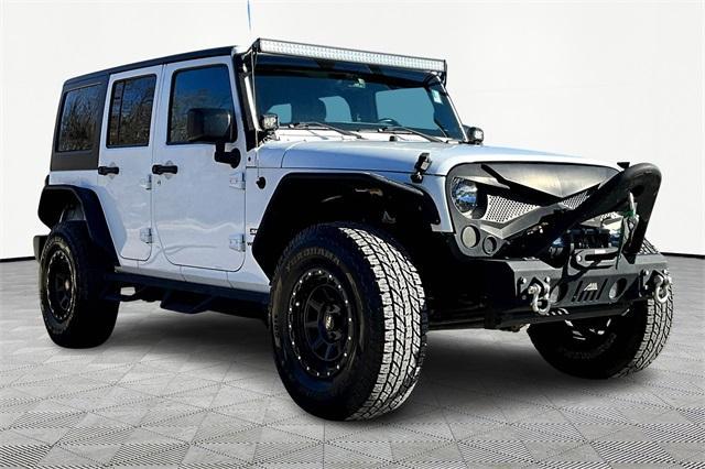 used 2017 Jeep Wrangler Unlimited car, priced at $17,234