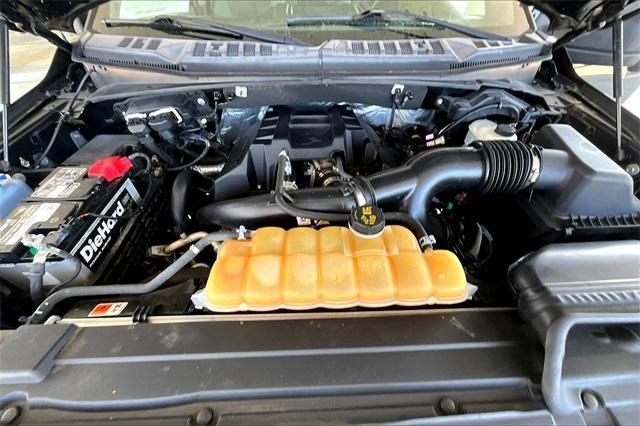 used 2015 Ford F-150 car, priced at $10,000
