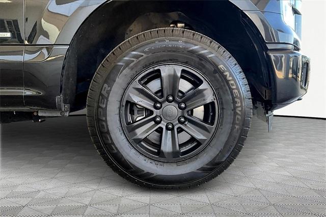 used 2015 Ford F-150 car, priced at $10,000