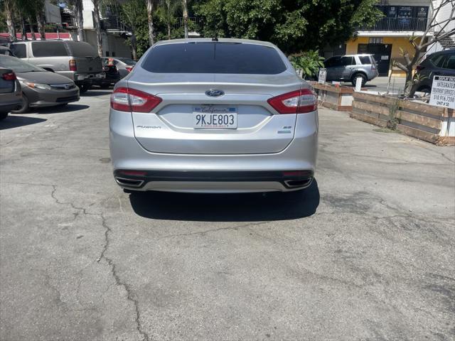 used 2016 Ford Fusion car, priced at $7,499