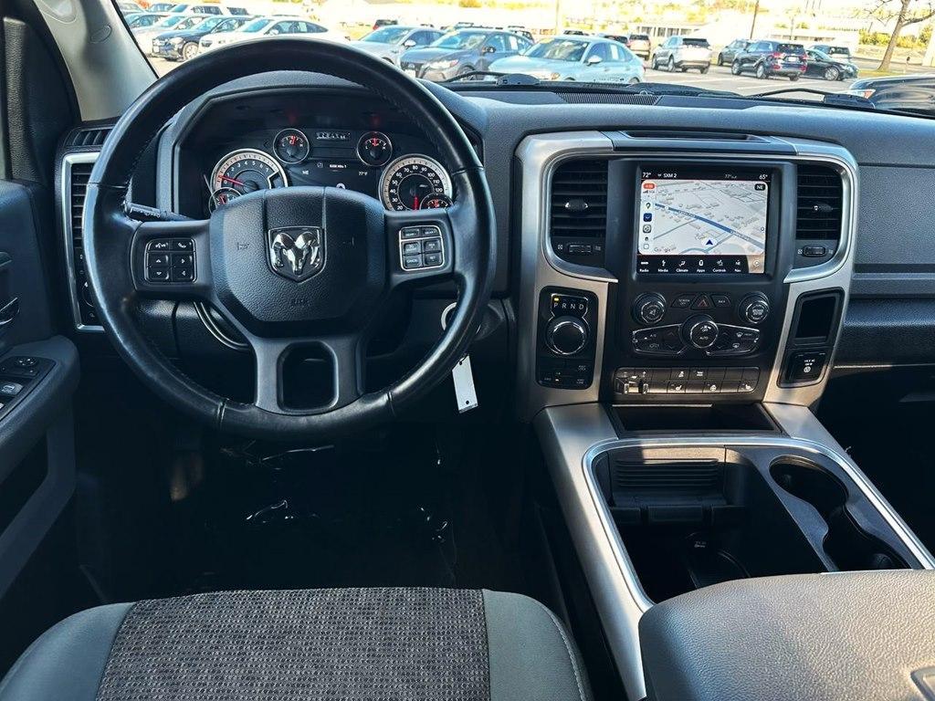 used 2018 Ram 1500 car, priced at $24,698