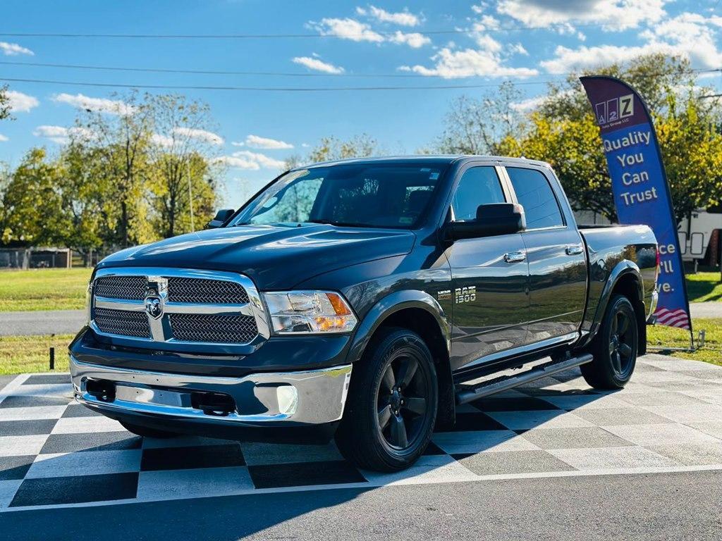 used 2018 Ram 1500 car, priced at $24,698