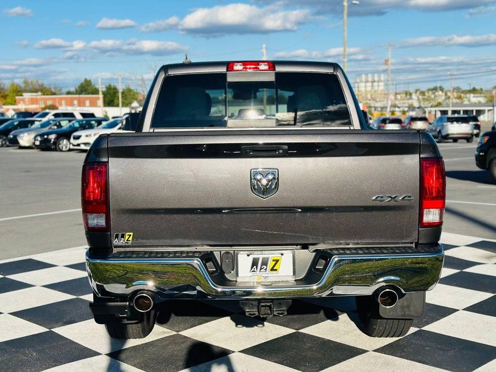used 2018 Ram 1500 car, priced at $24,698