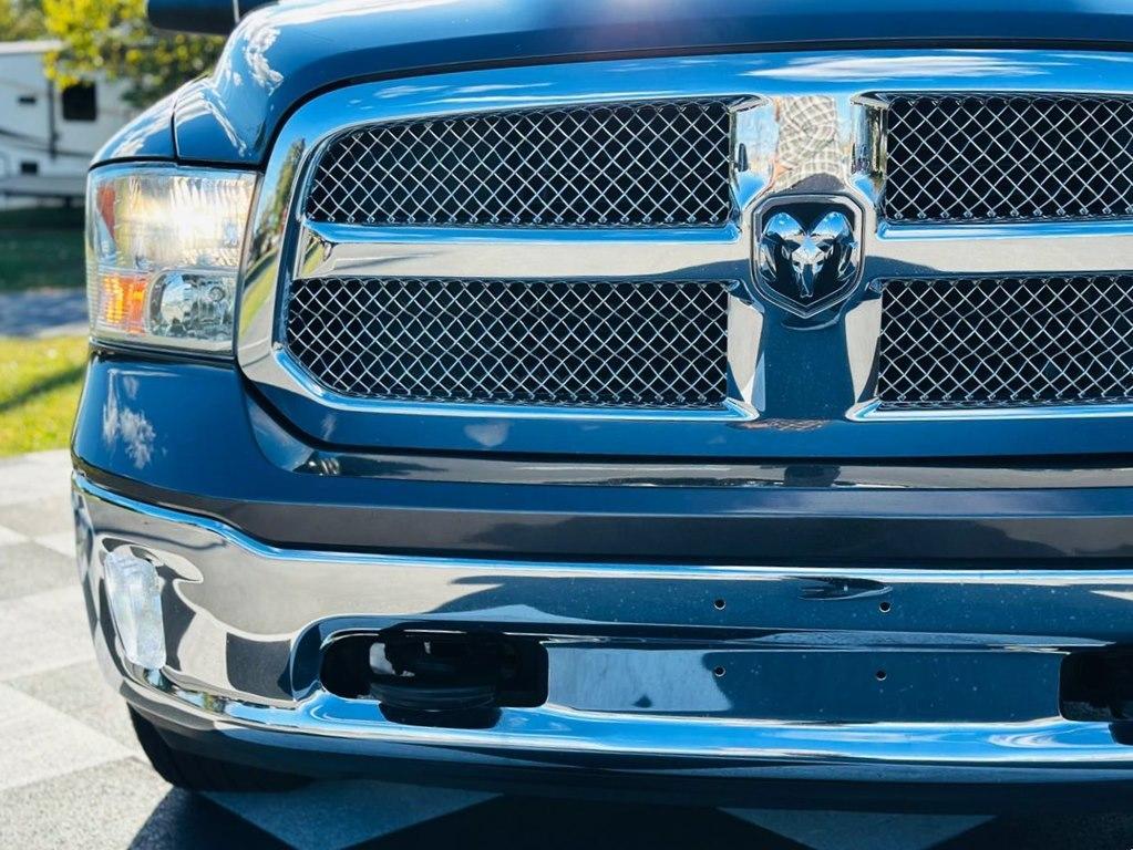 used 2018 Ram 1500 car, priced at $24,698