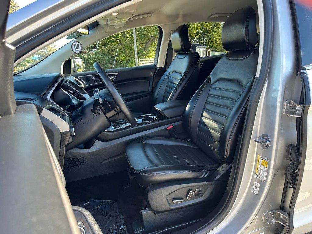 used 2018 Ram 1500 car, priced at $24,698