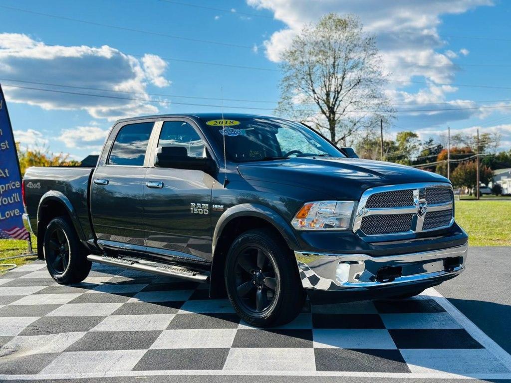 used 2018 Ram 1500 car, priced at $24,698