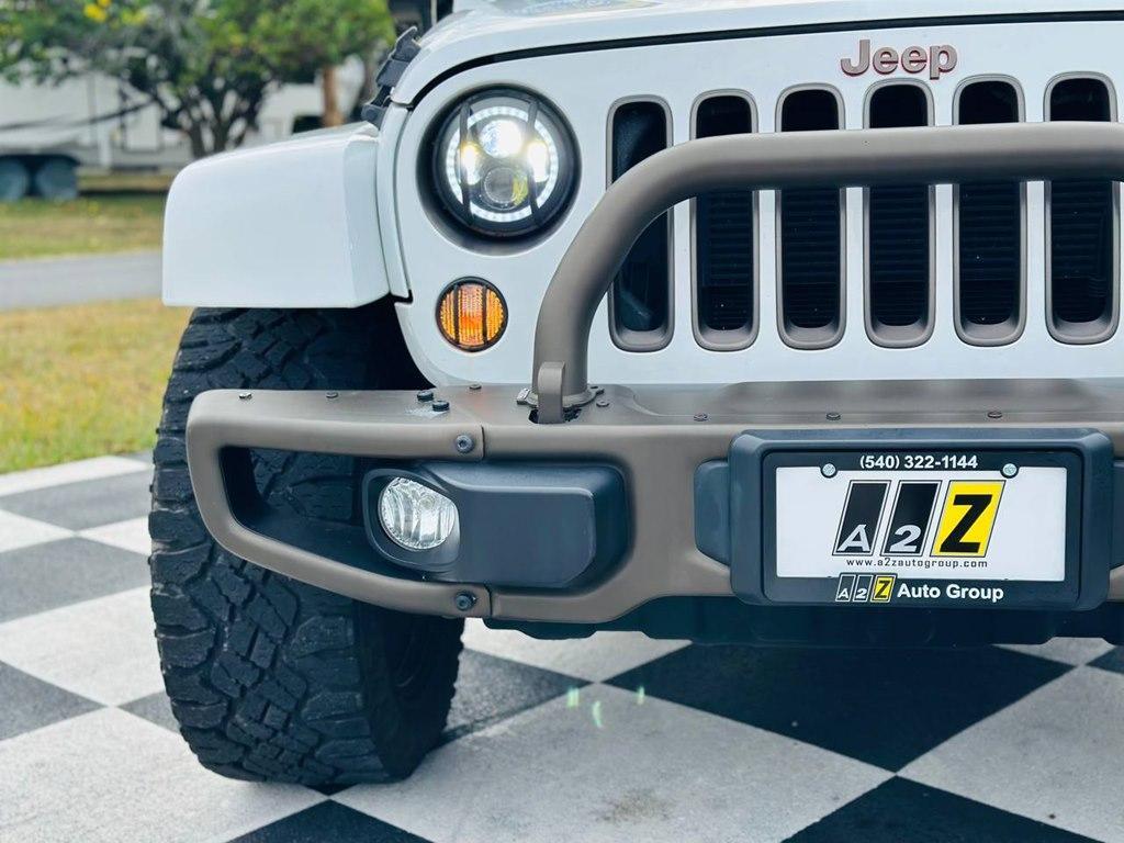 used 2016 Jeep Wrangler Unlimited car, priced at $22,704