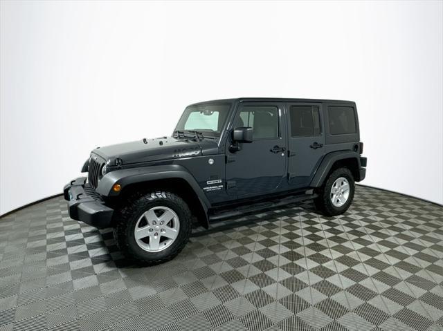 used 2017 Jeep Wrangler Unlimited car, priced at $21,497