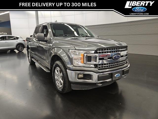 used 2018 Ford F-150 car, priced at $14,000