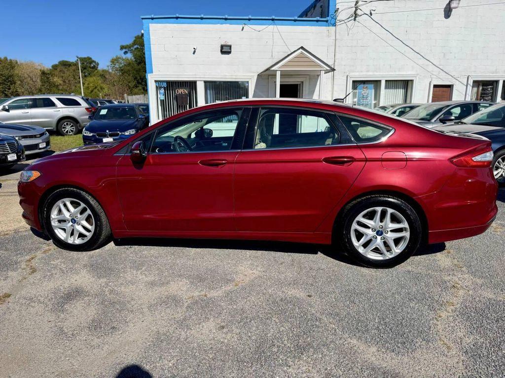 used 2014 Ford Fusion car, priced at $7,495