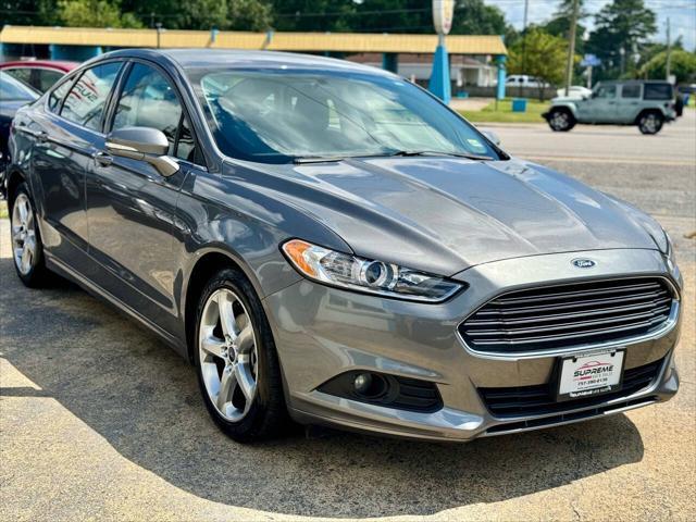 used 2014 Ford Fusion car, priced at $7,995