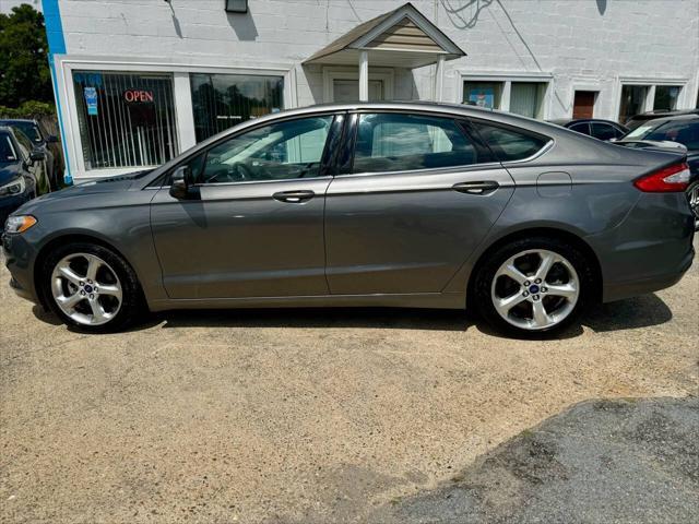 used 2014 Ford Fusion car, priced at $7,995