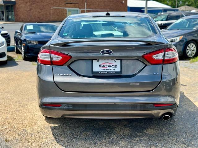 used 2014 Ford Fusion car, priced at $7,995