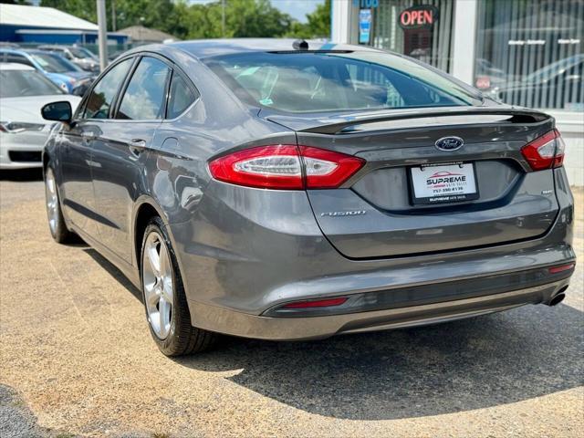 used 2014 Ford Fusion car, priced at $7,995