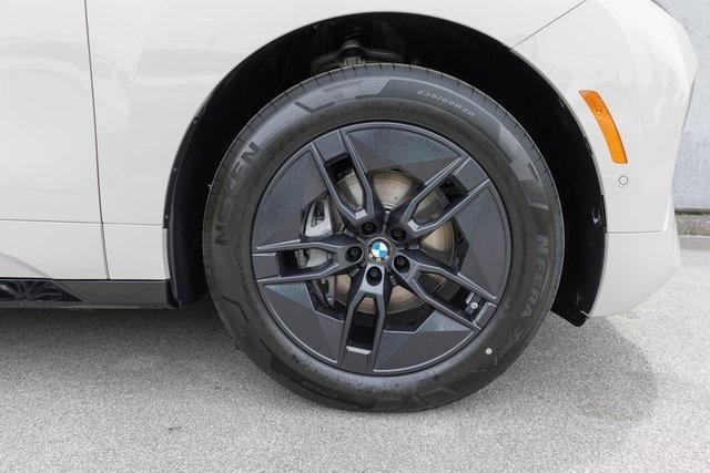 new 2026 BMW iX car, priced at $88,445