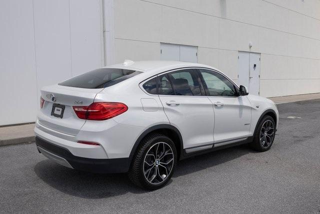 used 2018 BMW X4 car, priced at $19,899