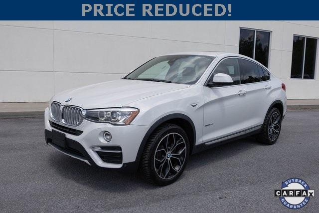 used 2018 BMW X4 car, priced at $19,899