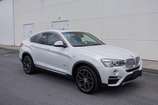 used 2018 BMW X4 car, priced at $19,899