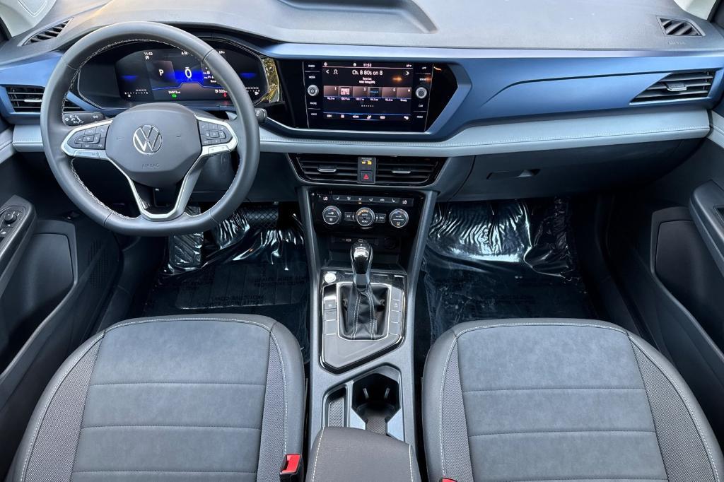 used 2024 Volkswagen Taos car, priced at $23,621