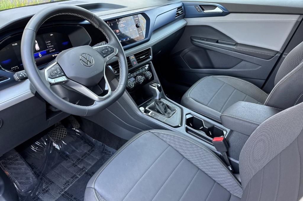 used 2024 Volkswagen Taos car, priced at $23,621