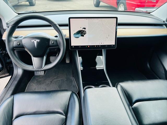 used 2019 Tesla Model 3 car, priced at $29,950