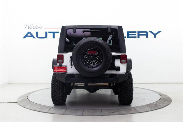 used 2015 Jeep Wrangler Unlimited car, priced at $25,980