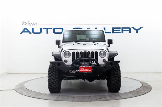 used 2015 Jeep Wrangler Unlimited car, priced at $25,980