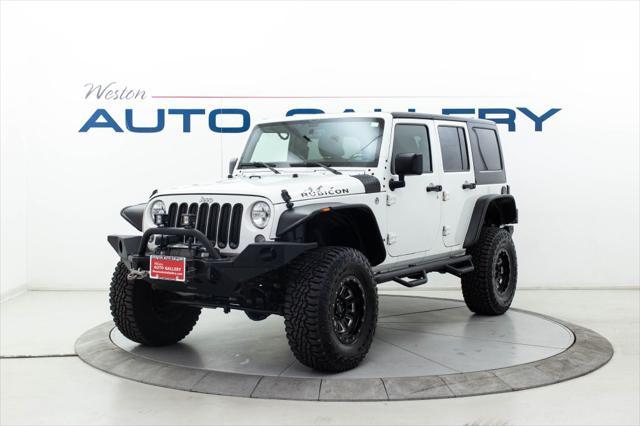 used 2015 Jeep Wrangler Unlimited car, priced at $25,980