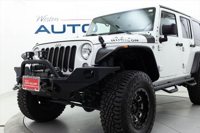 used 2015 Jeep Wrangler Unlimited car, priced at $25,980