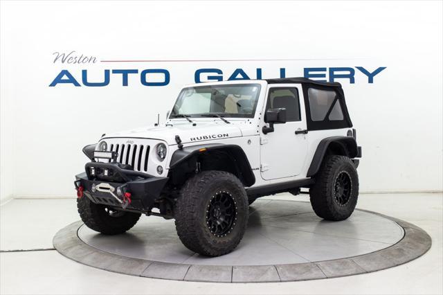 used 2016 Jeep Wrangler car, priced at $28,980