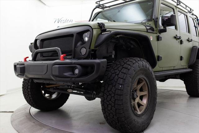 used 2013 Jeep Wrangler Unlimited car, priced at $30,980