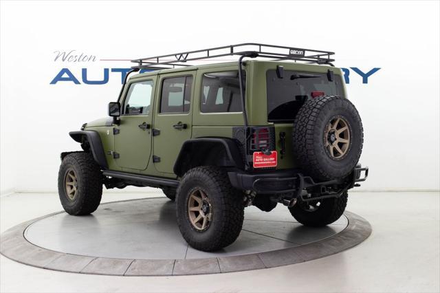 used 2013 Jeep Wrangler Unlimited car, priced at $30,980