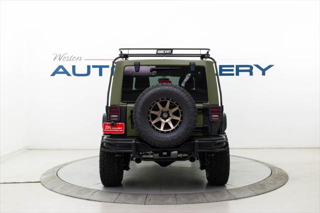 used 2013 Jeep Wrangler Unlimited car, priced at $30,980