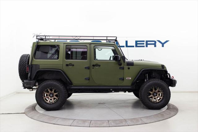 used 2013 Jeep Wrangler Unlimited car, priced at $30,980