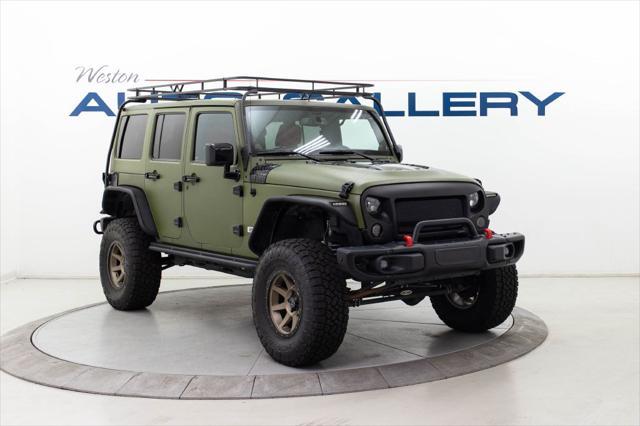 used 2013 Jeep Wrangler Unlimited car, priced at $30,980