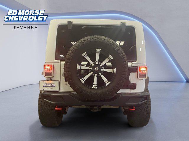 used 2016 Jeep Wrangler Unlimited car, priced at $30,795