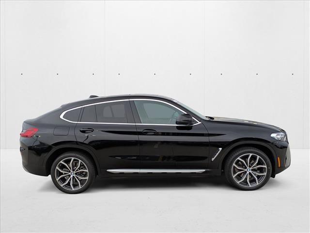 used 2023 BMW X4 car, priced at $38,995