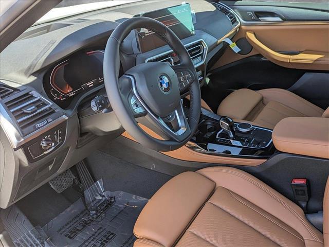 used 2025 BMW X4 car, priced at $57,330