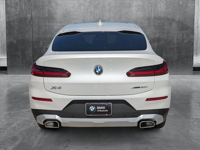 used 2025 BMW X4 car, priced at $57,330