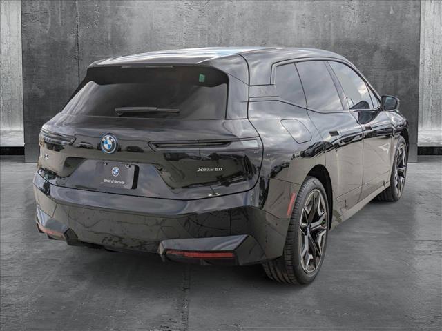 new 2025 BMW iX car, priced at $100,325